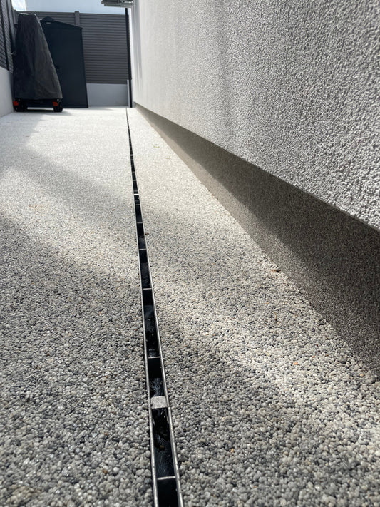 The Benefits of Installing Channel Drains for Your Driveway & Patio