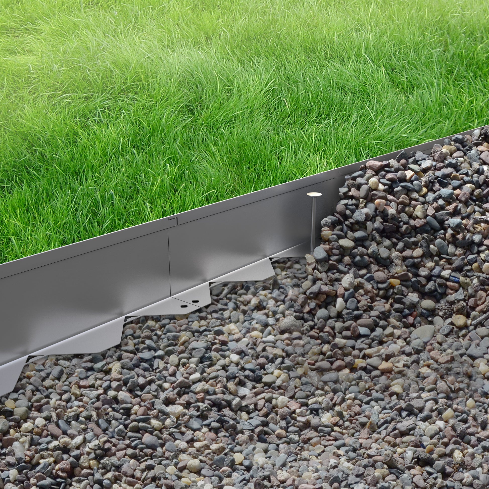 Galvanised Steel Border Edging System dividing grass and stones